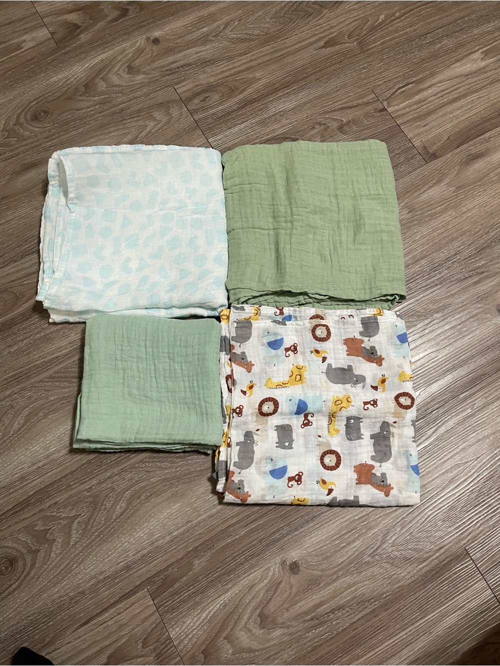 Set of 4 Baby Muslin Swaddles - Green, Light Blue Animal Spots & Animal Print